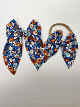 Load image into Gallery viewer, Small Rust and blue floral bow on nylon headband
