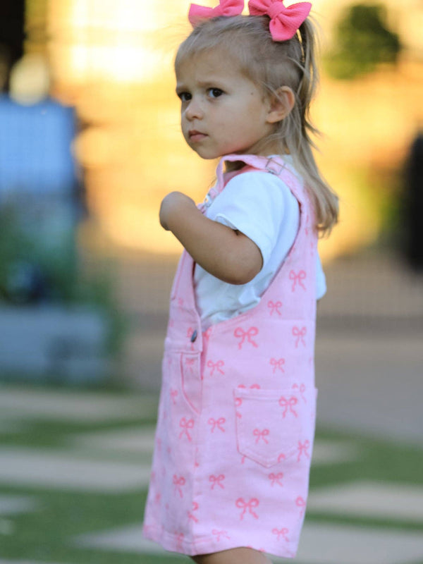 pink denim overall dress Coffee In Calabasas Distressed Overall Dress in Pink